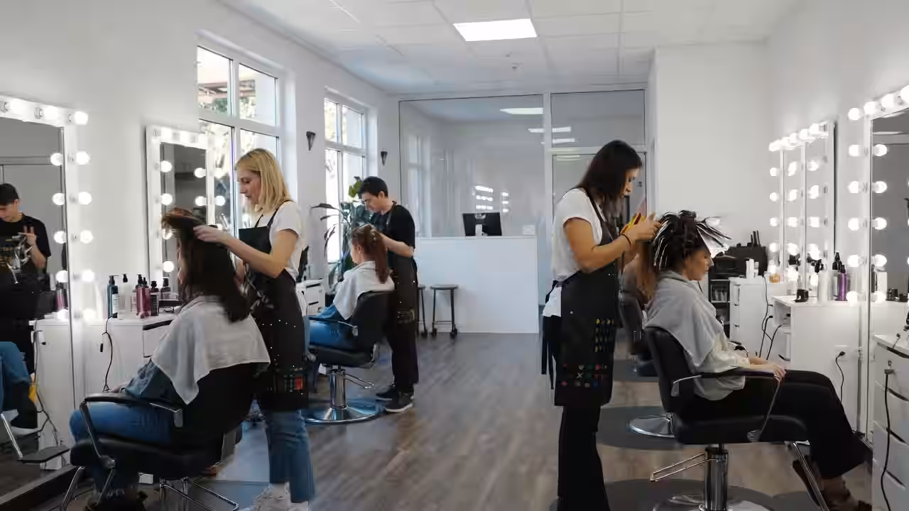 Customers enjoying a professional hair salon experience