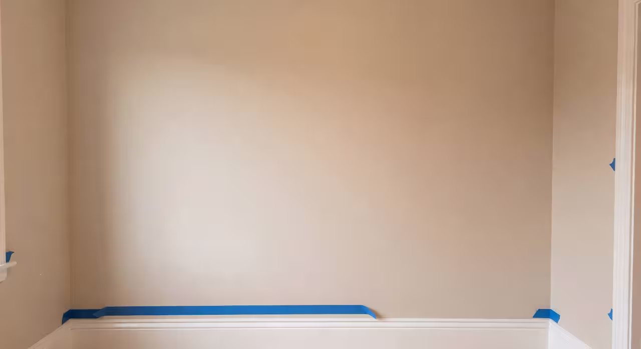 A freshly decorated bedroom with smooth matt walls