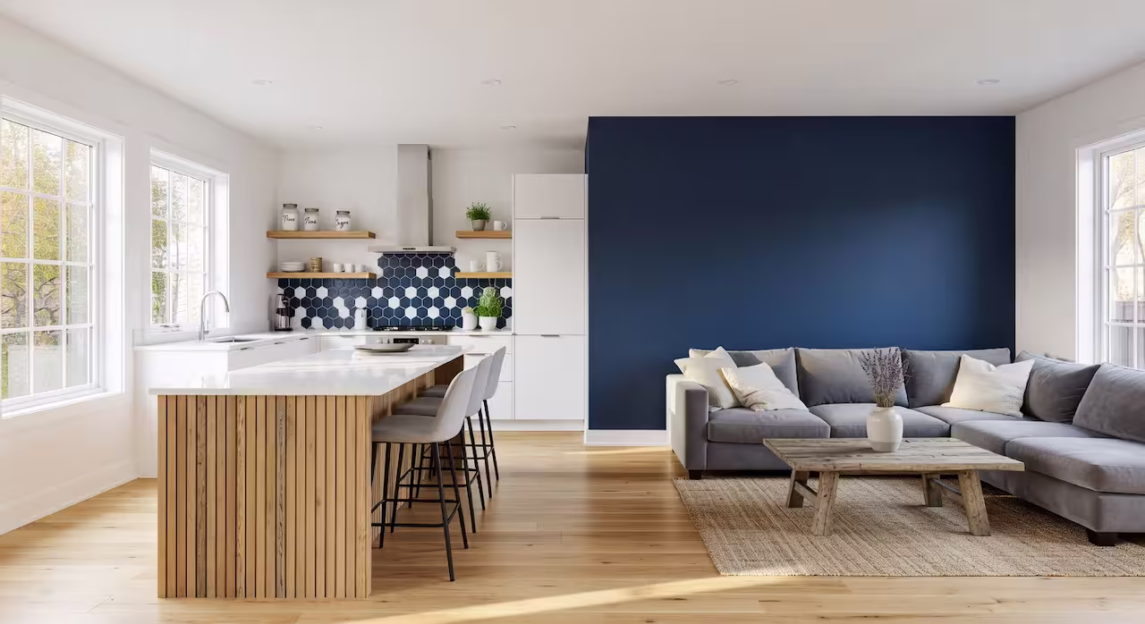 A freshly painted open-plan kitchen with a navy accent wall